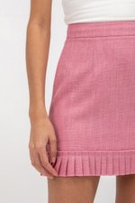 EMIRI PLEATED HEM MINI SKIRT