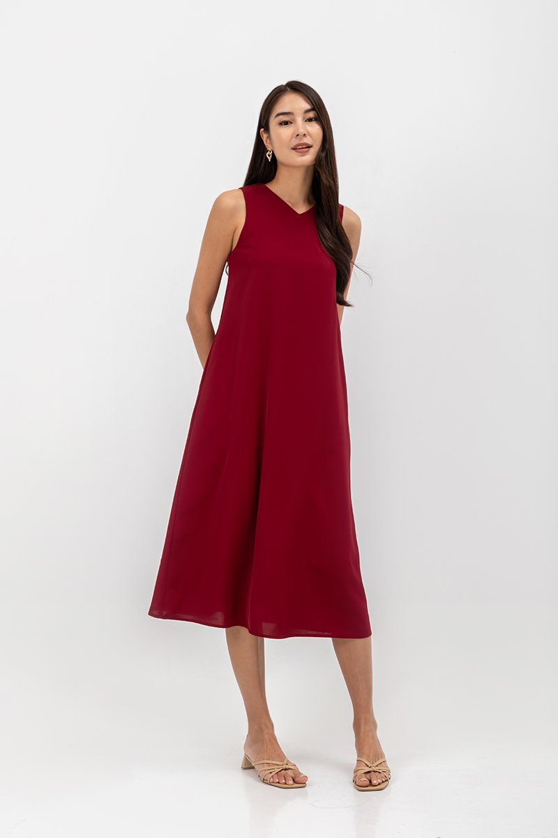 NAILA HIGH V NECK SLEEVELESS MIDI DRESS