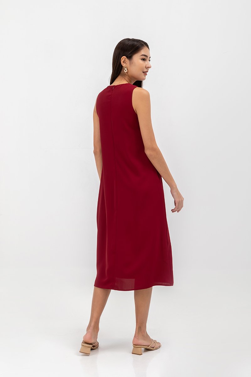 NAILA HIGH V NECK SLEEVELESS MIDI DRESS