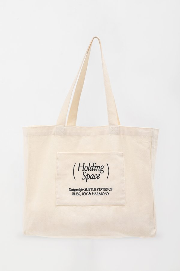 HOLDING SPACE TOTE BAG HOLDING SPACE TOTE BAG