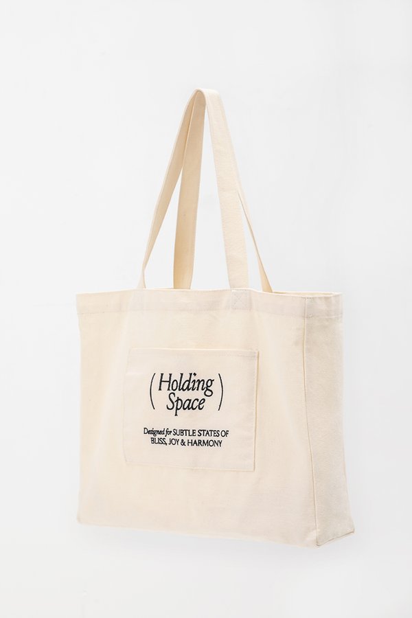 HOLDING SPACE TOTE BAG HOLDING SPACE TOTE BAG