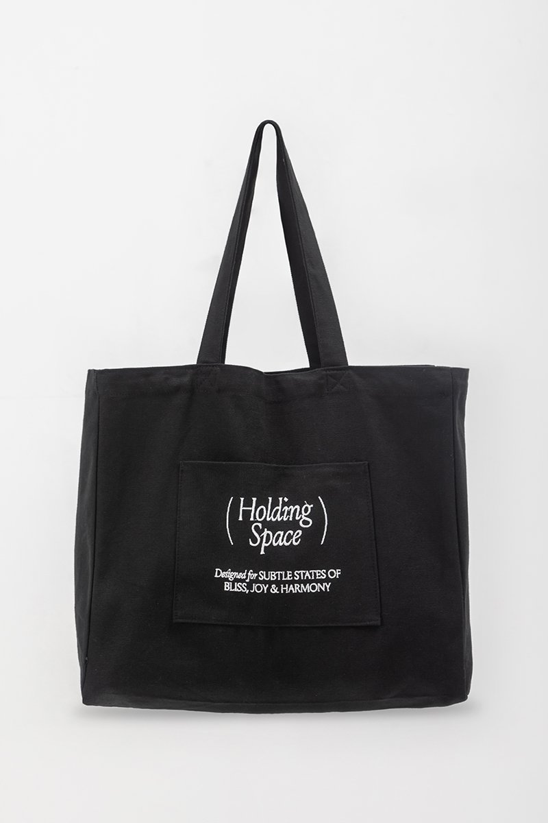 HOLDING SPACE TOTE BAG