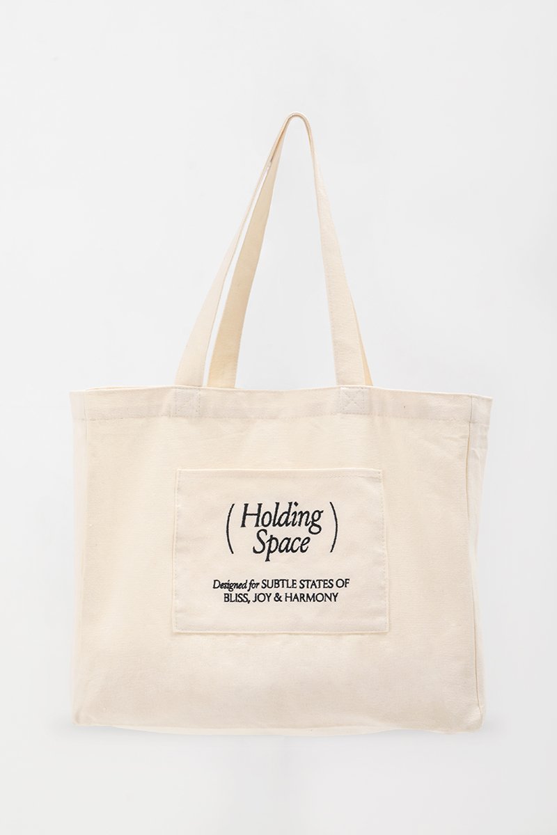 HOLDING SPACE TOTE BAG