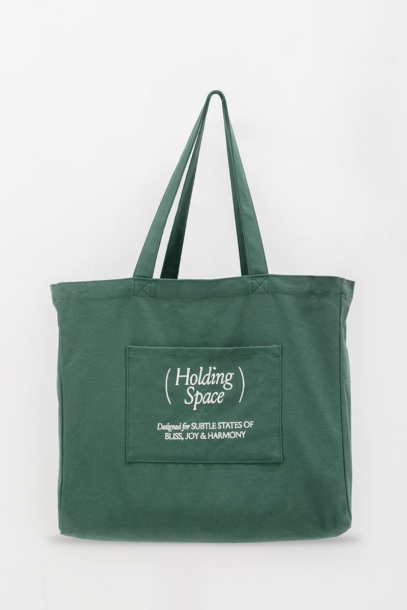 HOLDING SPACE TOTE BAG