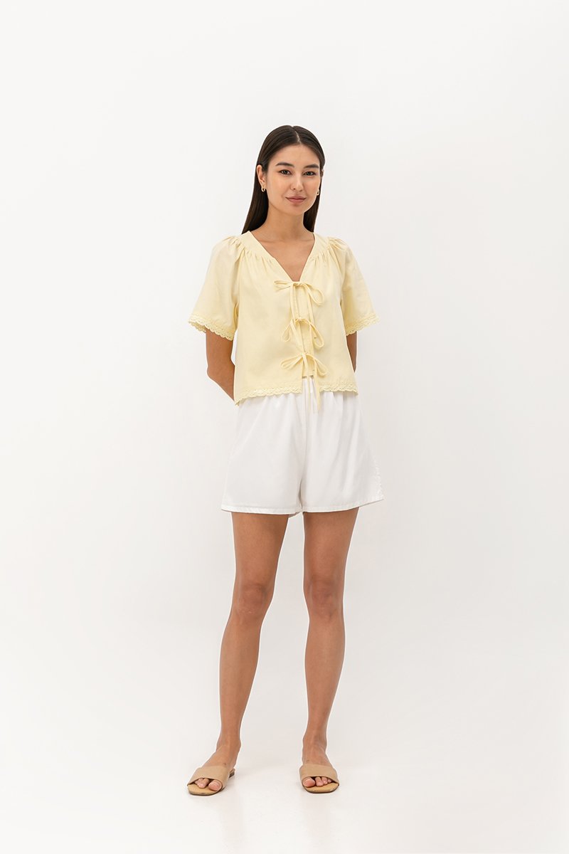 SANNY TIE FRONT LACE HEM TOP