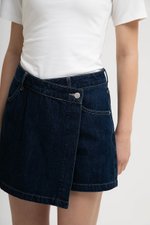 RHODE MID RISE ASYMMETRIC DENIM SKORT
