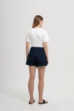 RHODE MID RISE ASYMMETRIC DENIM SKORT