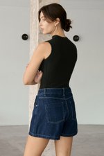 RHODE MID RISE ASYMMETRIC DENIM SKORT