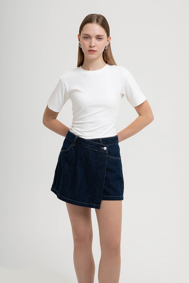 RHODE MID RISE ASYMMETRIC DENIM SKORT