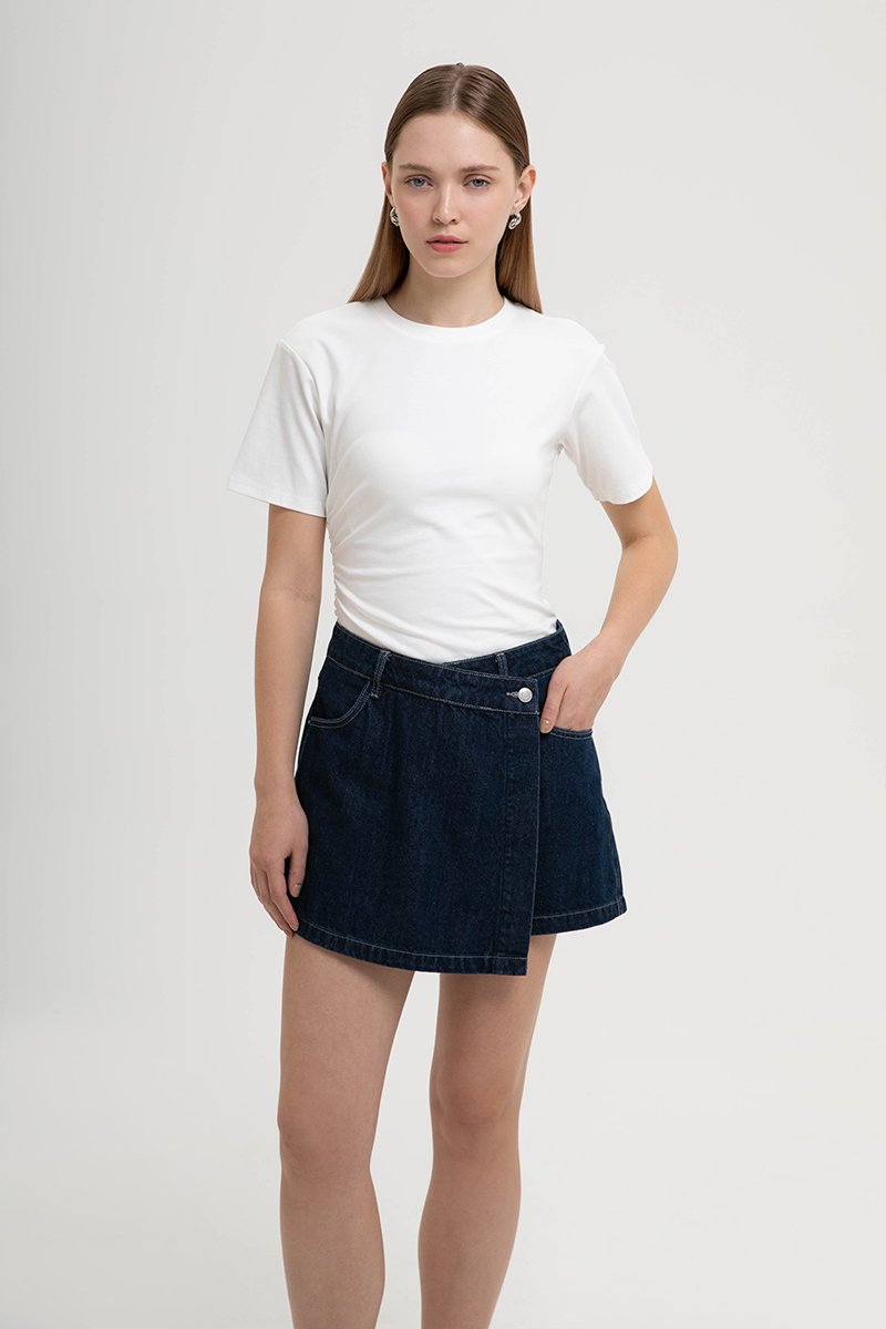 RHODE MID RISE ASYMMETRIC DENIM SKORT