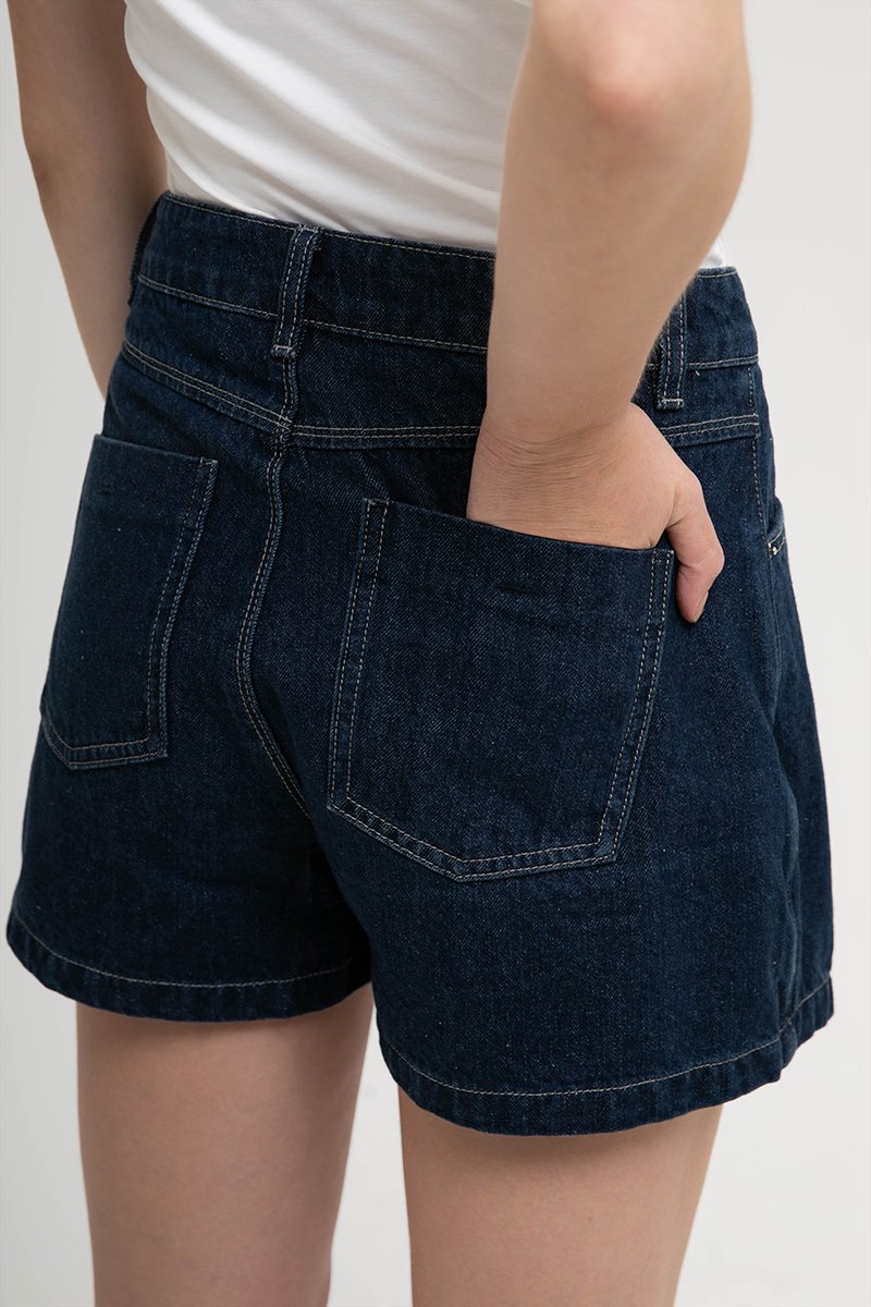 RHODE MID RISE ASYMMETRIC DENIM SKORT