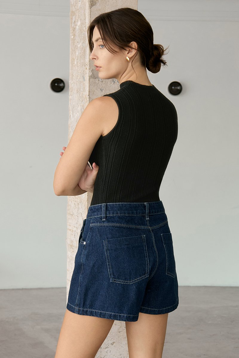 RHODE MID RISE ASYMMETRIC DENIM SKORT